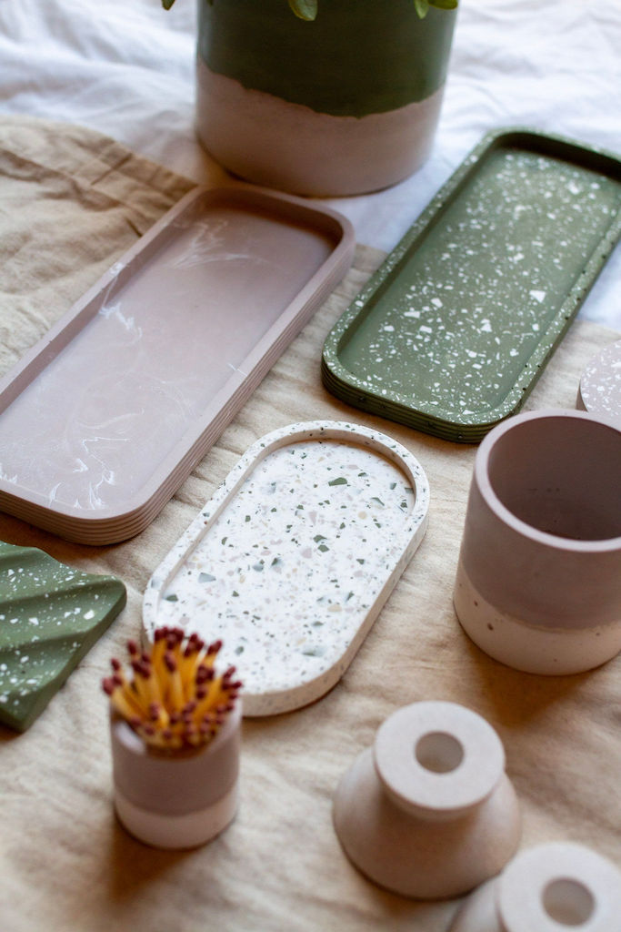 Flora homeware - jesmonite terrazzo trays and planters with linen background